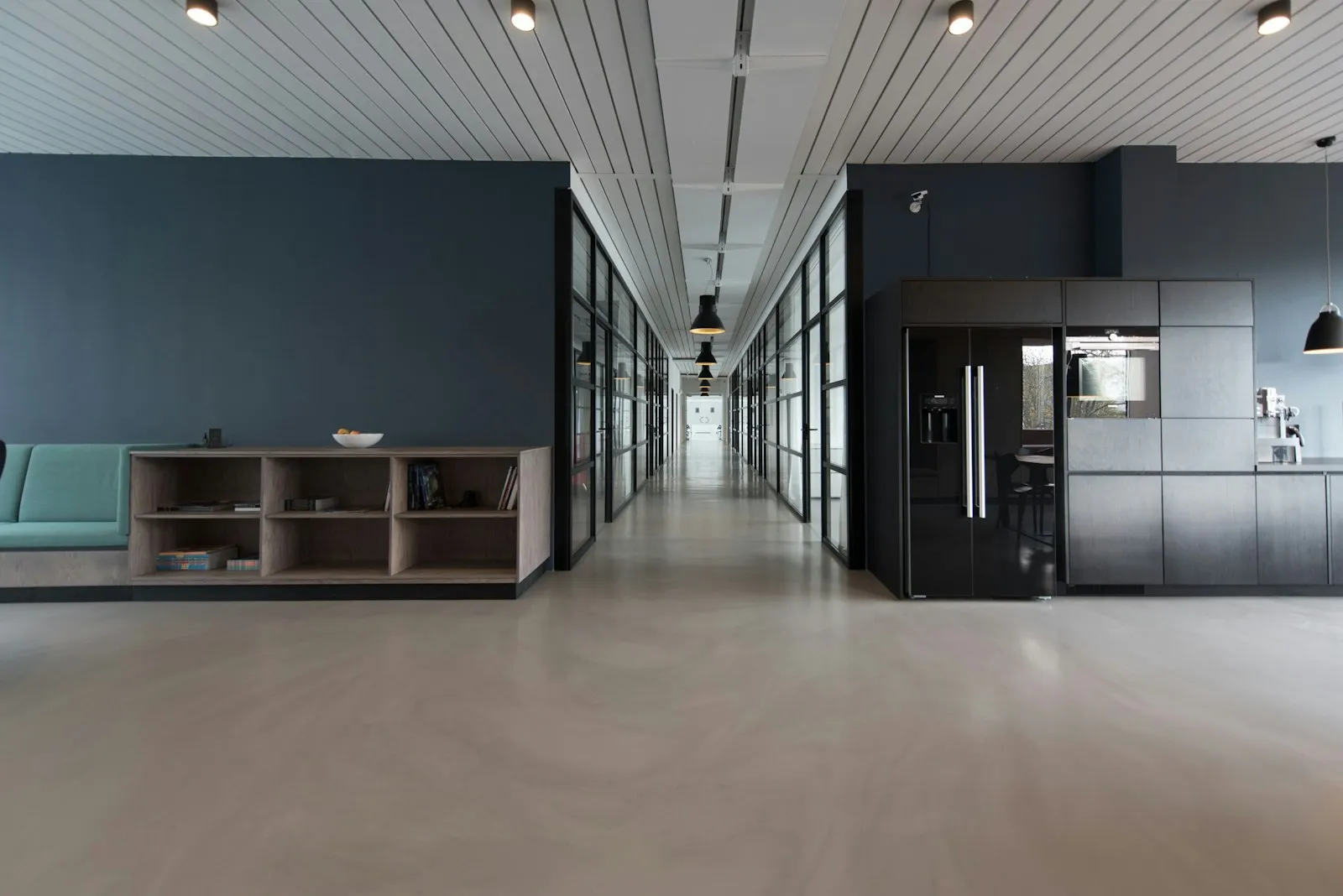 Modern office interior with glass meeting rooms